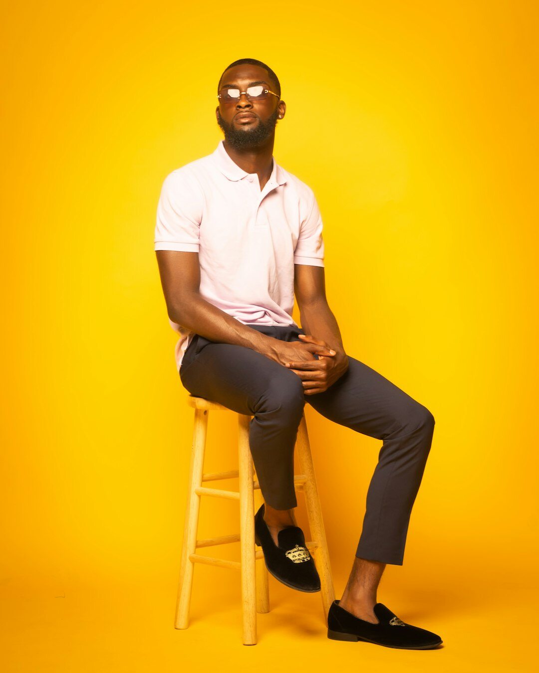 Studio portrait of a man facilitator in business casual attire